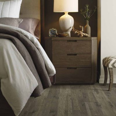 wood look laminate floors in a cozy OK City bedroom